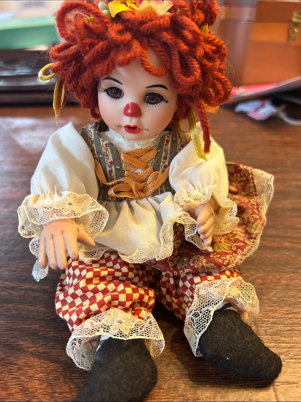 2007 Marie Osmond Porcelain Clown Doll with Red Yarn Hair and Patterned Outfit